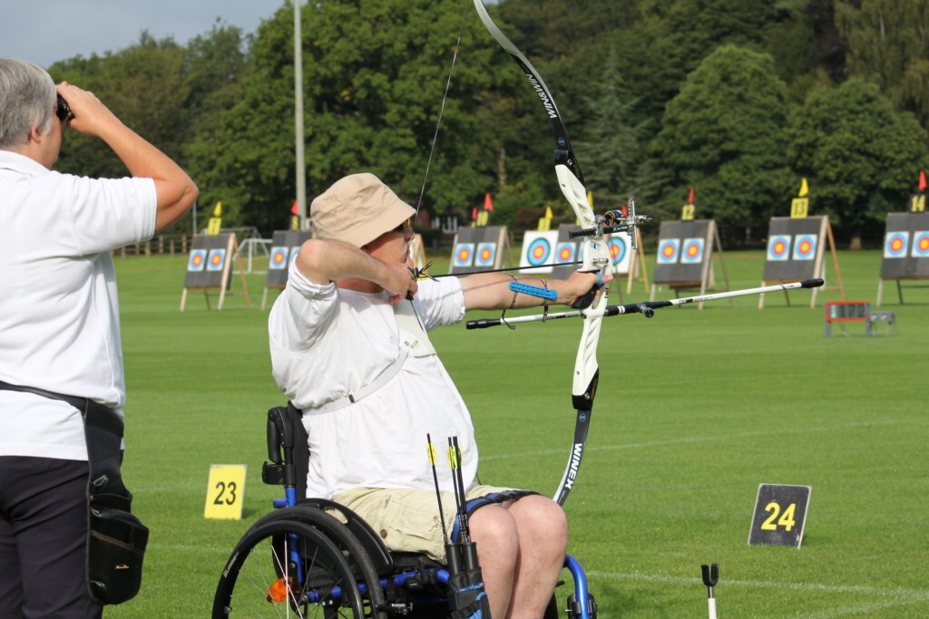 Blind archer shooting at a competition